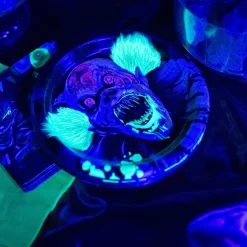 Party City Creepy Carnival Black Light Reactive Paper Dessert Plates, 6.75In, 20Ct| Creepy Carnival